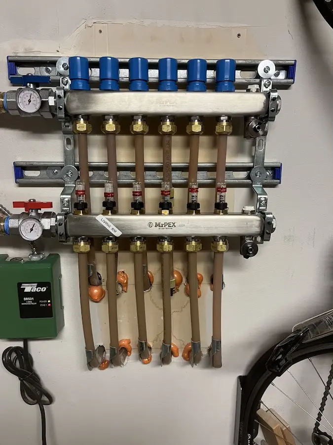 Plumber performing Gas Line Installation at a residential property in Hartwell